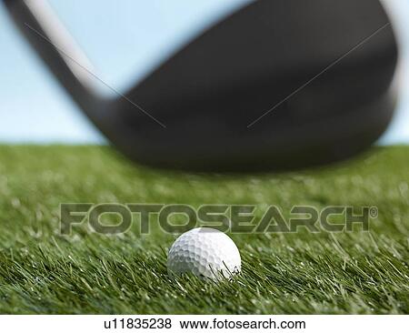 Stock Photo - Golf Club Hitting Ball. Fotosearch