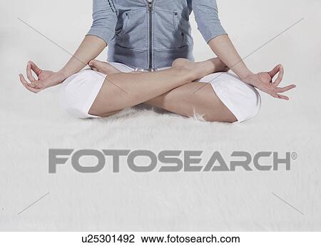 Mid-Adult Woman in Lotus Position View Large Photo Image Stock Image - Mid-Adult Woman in Lotus Position. Fotosearch