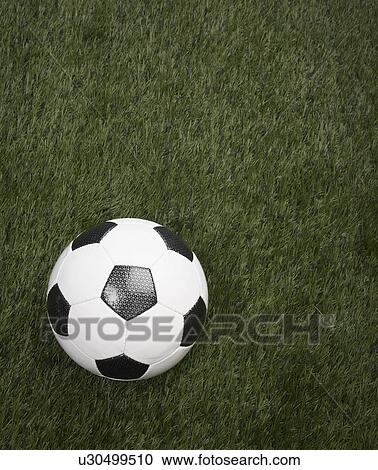 Stock Image - Soccer Ball on Grass. Fotosearch