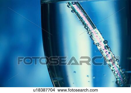 Straw In Glass Of Water View Large Photo Image Picture - Straw In Glass Of Water. Fotosearch