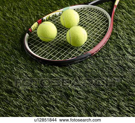 Picture - Tennis Balls on Racket. Fotosearch