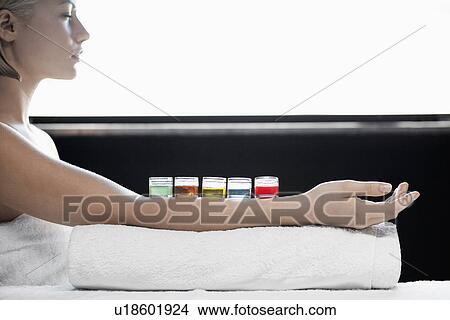 Young woman receiving aroma therapy View Large Photo Image Picture - Young woman receiving aroma therapy. Fotosearch