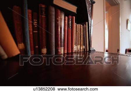 Stock Photo - Books On Wooden Shelf. Fotosearch