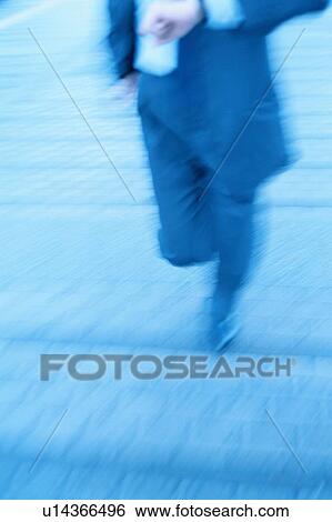 Stock Photograph - Businessman Running. Fotosearch