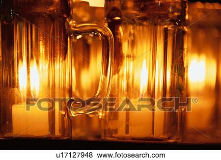 Candles In Glass Jugs View Large Photo Image Stock Photo - Candles In Glass Jugs. Fotosearch