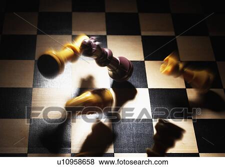 Chess Pieces Falling on Board View Large Photo Image Stock Photo - Chess Pieces Falling on Board. Fotosearch