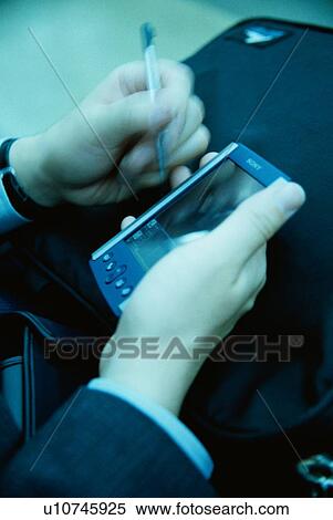Man Using Handheld Computer View Large Photo Image Stock Photography - Man Using Handheld Computer. Fotosearch