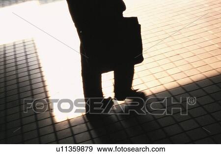 Man Walking On Tiled Floor View Large Photo Image Stock Photo - Man Walking On Tiled Floor. Fotosearch