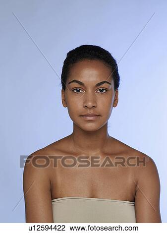 Stock Image - Portrait of young woman. Fotosearch