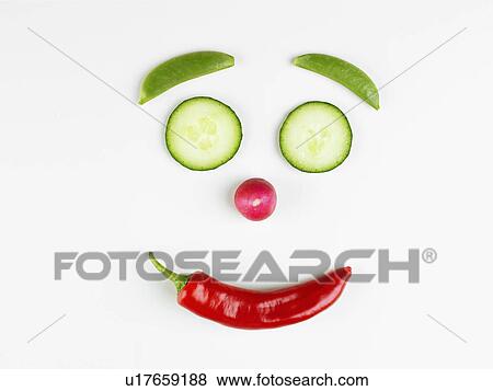 Smiley face made of vegetables (close-up) View Large Photo Image Stock Photo - Smiley face made of vegetables (close-up). Fotosearch