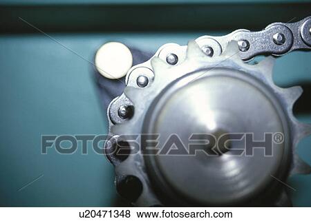 Stock Photo - The Gear And A Chain. Fotosearch