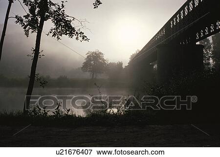 The River And The Bridge In The Morning Haze View Large Photo Image Stock Photo - The River And The Bridge In The Morning Haze. Fotosearch