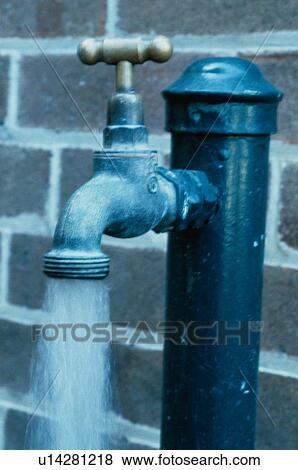 Stock Photo - Water Flowing From Faucet. Fotosearch