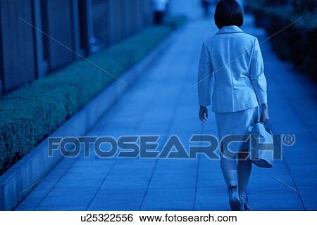 Woman Walking Down Street View Large Photo Image Stock Photograph - Woman Walking Down Street. Fotosearch