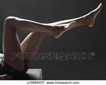 Stock Photo - Woman's bare legs (low section). Fotosearch