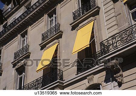 Stock Photography - A Building With A Yellow Blind. Fotosearch