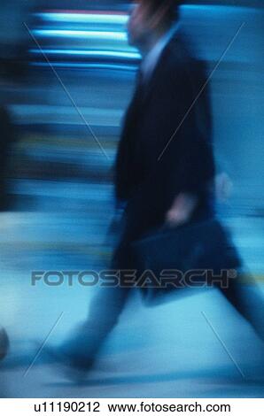 Stock Image - Businessman Walking. Fotosearch