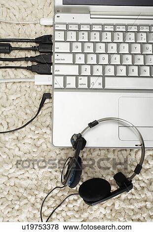 Cables Attached to Laptop View Large Photo Image Stock Photo - Cables Attached to Laptop. Fotosearch
