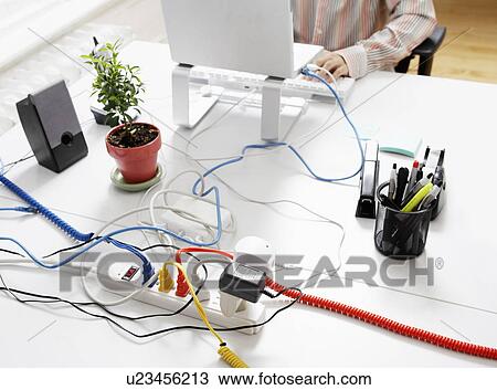 Stock Image - Computer Cables on Extension Cord. Fotosearch