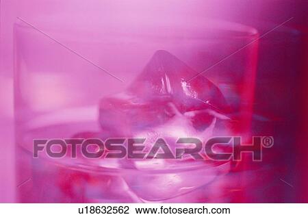 Stock Image - Ice Cube In Glass. Fotosearch
