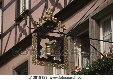 It Hangs And Is A Signboard. View Large Photo Image Stock Image - It Hangs And Is A Signboard.. Fotosearch