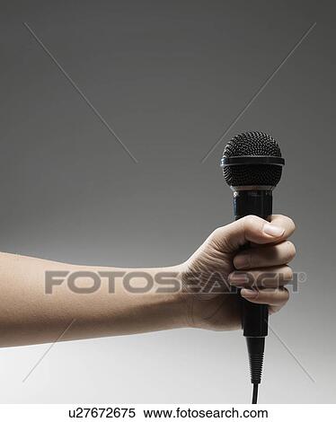 Man Holding Microphone View Large Photo Image Stock Photography - Man Holding Microphone. Fotosearch