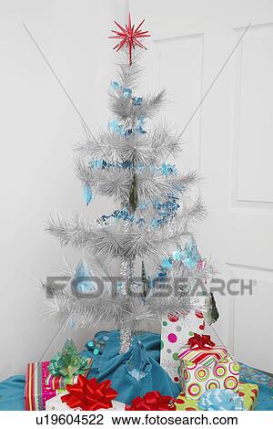 Presents under Christmas tree View Large Photo Image Stock Image - Presents under Christmas tree. Fotosearch