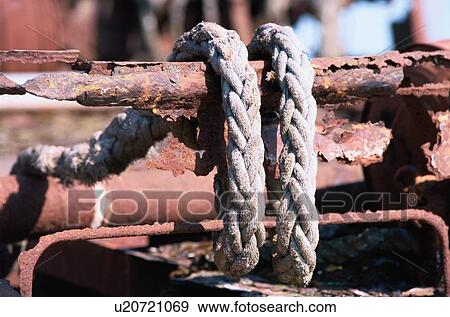 Rope Around Rusty Iron Bar View Large Photo Image Stock Photo - Rope Around Rusty Iron Bar. Fotosearch
