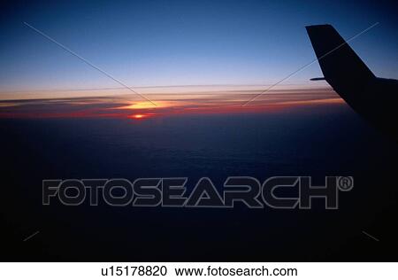 Setting Sun From Airplane View Large Photo Image Stock Image - Setting Sun From Airplane. Fotosearch