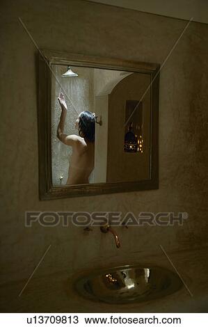 Woman in Shower Reflected in Mirror View Large Photo Image Stock Image - Woman in Shower Reflected in Mirror. Fotosearch