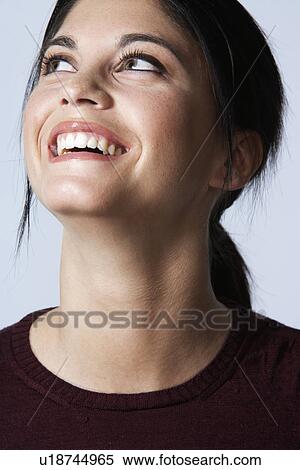 Young woman laughing View Large Photo Image Stock Photography - Young woman laughing. Fotosearch