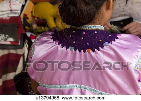 Stock Photo - Back view of mexican woman. Fotosearch