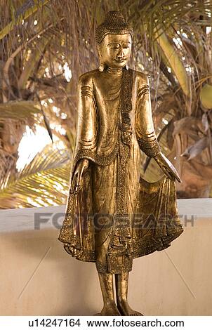 Picture - Buddha statue in Tulum Mexico. Fotosearch