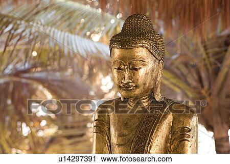 Stock Image - Buddha statue in Tulum Mexico. Fotosearch