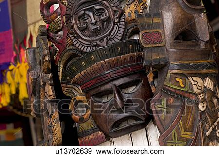 Carved wooden masks View Large Photo Image Stock Photo - Carved wooden masks. Fotosearch