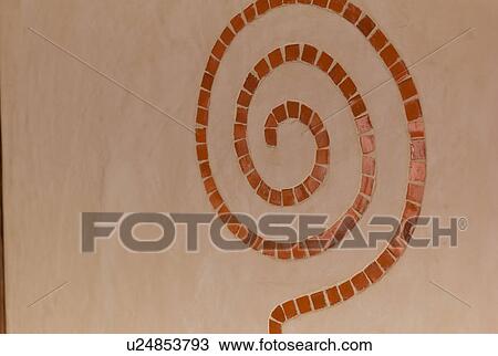 Stock Image - Circular symbol in tile. Fotosearch