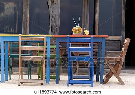Colourful tables and chairs in Tulum Mexico View Large Photo Image Picture - Colourful tables and chairs in Tulum Mexico. Fotosearch