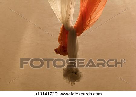 Drapery tied in a knot View Large Photo Image Stock Image - Drapery tied in a knot. Fotosearch