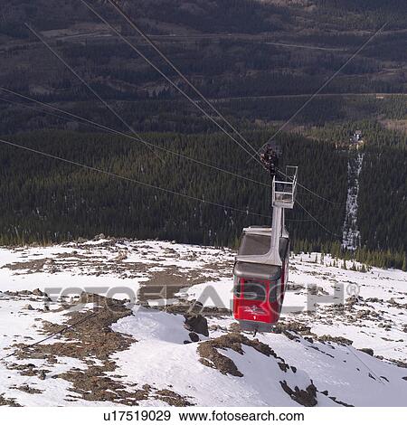 Gondola going up mountainside View Large Photo Image Stock Photo - Gondola going up mountainside. Fotosearch