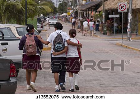 Group of people on street in Tulum Mexico View Large Photo Image Stock Photography - Group of people on street in Tulum Mexico. Fotosearch