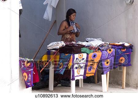 Mexican woman at outdoor market View Large Photo Image Stock Image - Mexican woman at outdoor market. Fotosearch