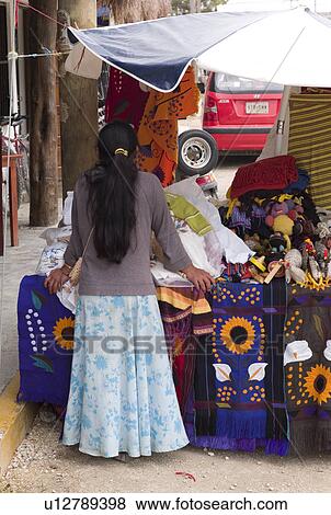 Stock Photo - Mexican woman at outdoor market. Fotosearch