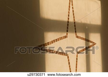 Stock Image - Mosaic tile design on wall. Fotosearch