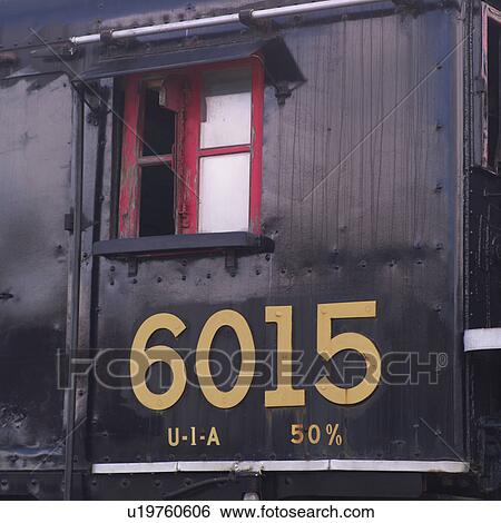 Stock Photograph - Numbers on the side of a train. Fotosearch