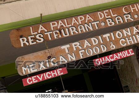 Stock Image - Restaurant sign in Tulum Mexico. Fotosearch