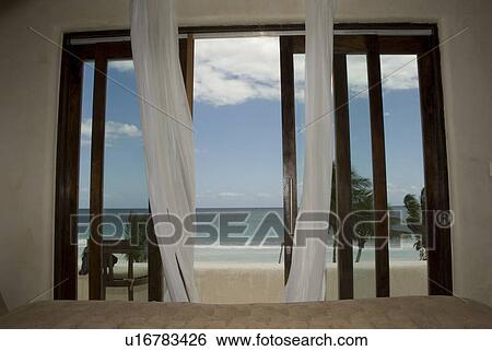 Sheer drapery overy doorway View Large Photo Image Stock Photograph - Sheer drapery overy doorway. Fotosearch