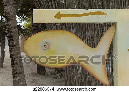 Sign in the shape of a fish View Large Photo Image Picture - Sign in the shape of a fish . Fotosearch