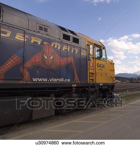Spiderman sign on side of Via Rail train View Large Photo Image Stock Image - Spiderman sign on side of Via Rail train. Fotosearch