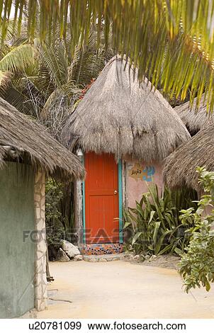 Thatched hut in Tulum Mexico View Large Photo Image Stock Photo - Thatched hut in Tulum Mexico. Fotosearch