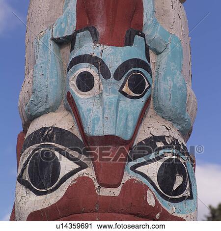 Stock Image - Totem pole in Jasper Alberta. Fotosearch